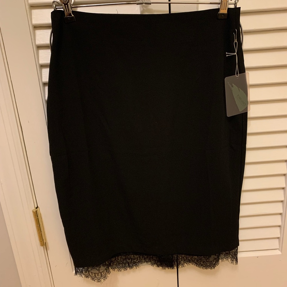 Womens new with tags forever 21 midi black skirt